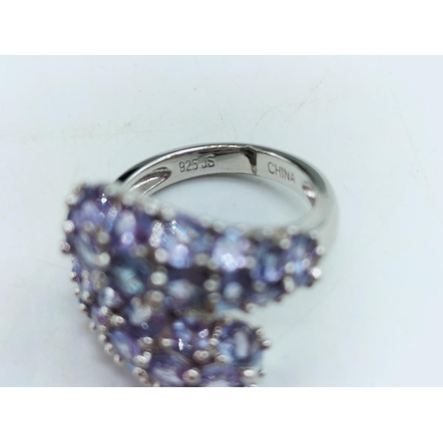 89 - 925 Silver Snake Ring set with Tanzanite. Size O.