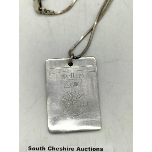106 - Silver Hallmarked Malboro Sun Pendant and Chain.