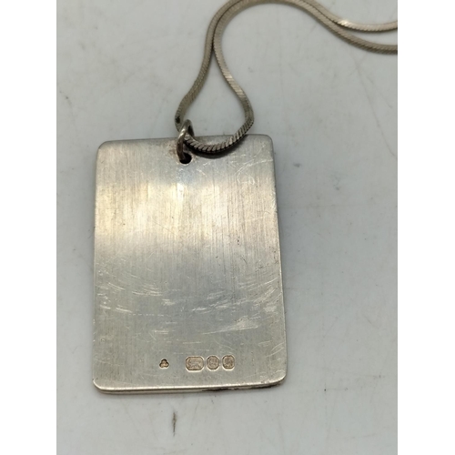 106 - Silver Hallmarked Malboro Sun Pendant and Chain.