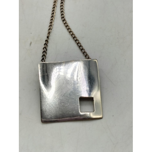 110 - 925 Silver Designer Pendant and Chain.