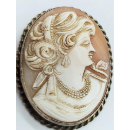 668 - Silver Band Ring plus Silver Cameo Brooch.