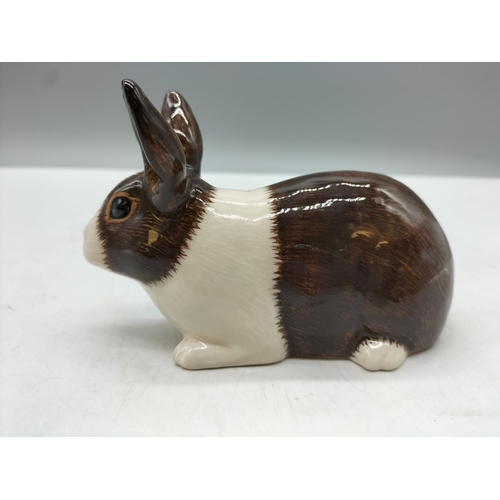 102 - Quail Pottery Figure of a Rabbit. 14cm x 8cm.