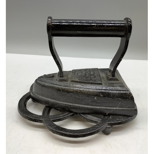 410 - Cast Iron Salter Staffordshire Knot Iron on Stand.