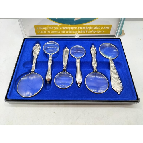 425 - Boxed Set of 6 Ornate Handled Magnifying Glasses.