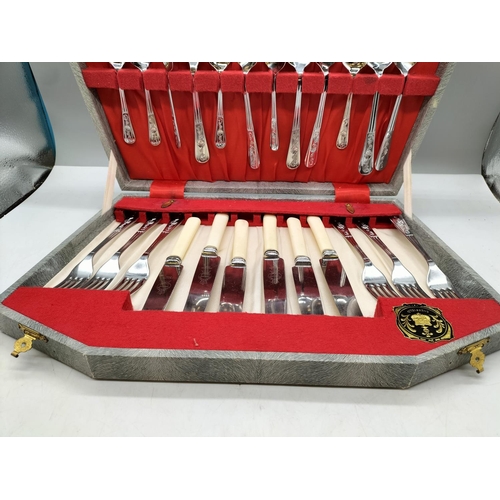 523 - Cased Sheffield Plated 24 Piece Cutlery Set.