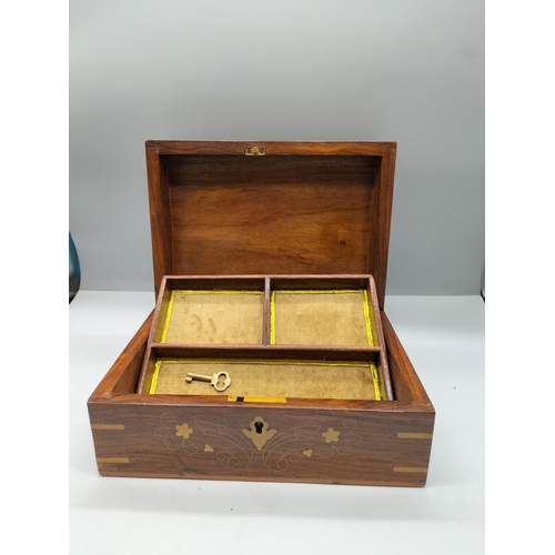 62 - Wooden Jewellery Box with Brass Design and Banding. With Lock and Key. 11cm High, 25cm x 18cm.