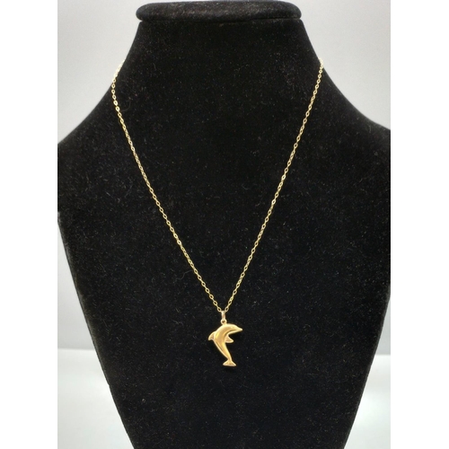 98 - 375 9ct Gold Dolphin Pendant and Chain. 0.8 Gram