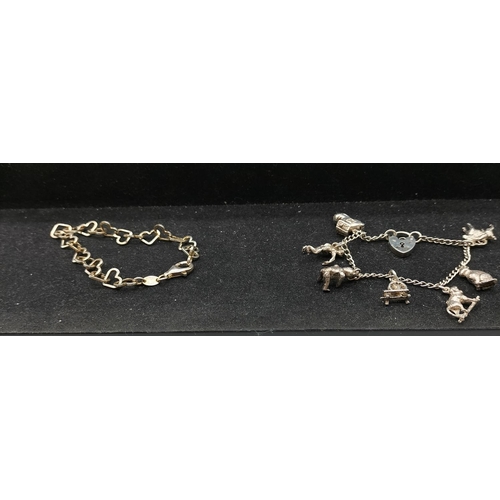 99 - Silver Charm Bracelet plus 925 Silver Bracelet.