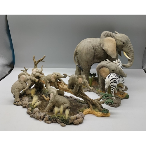 115A - Tuskers Elephant Figures (2). Largest being 24cm x 20cm.