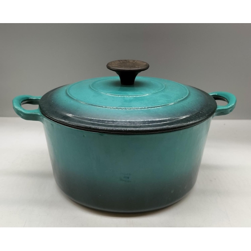 168 - Cast Iron Lidded Cooking Pan. Heavily Stained. 13cm High, 24cm Diameter.