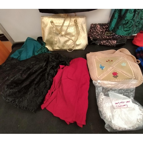 519 - 2 Bags of Ladies Clothes and Handbags.