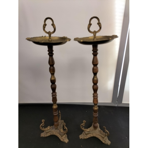 89 - Brass and Wood Ornate Ashtrays (2). 68cm High.