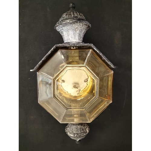 13 - Cast Aluminium Lamp with Amber Glass Octagonal Shade. 47cm x 24cm.