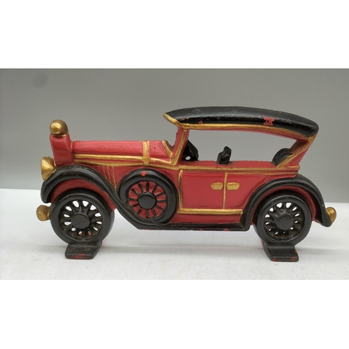 187 - Cast Metal Model of a Car Doorstop. 29cm x 13cm.