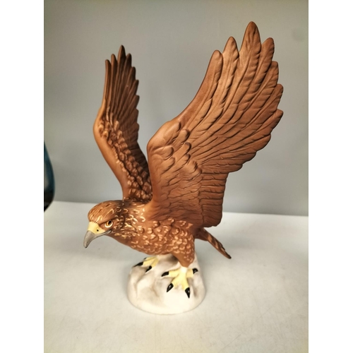 202 - Beswick Matt Figure of a Golden Eagle. 27cm x 18cm.