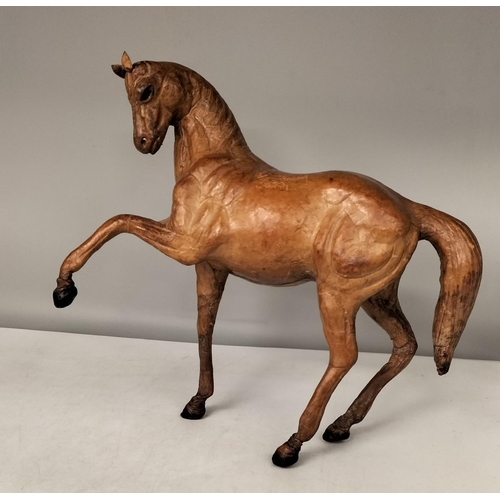 206 - Leather Horse. 25cm x 27cm.