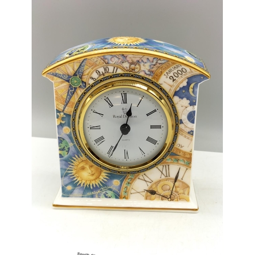 214 - Royal Doulton Mantle Clock in the 'Millenium' Pattern. 12cm x 11cm.