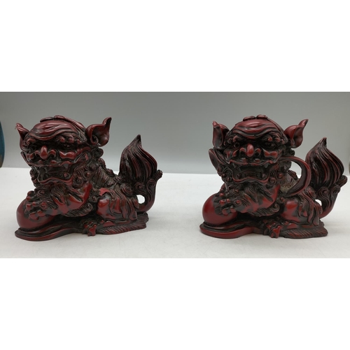 240 - Pair of Red Resin Oriental Foo Dogs, 14cm x 12cm. One A/F.