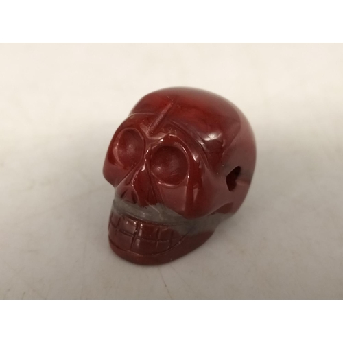 288 - Red Agate Model of a Skull 2cm x 2cm x 3cm.