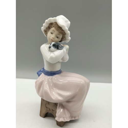 43 - Nao Figure of a Girl with Puppy. 17cm High.