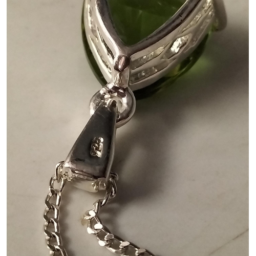 550 - 925 Silver Pendant with Green Stone.