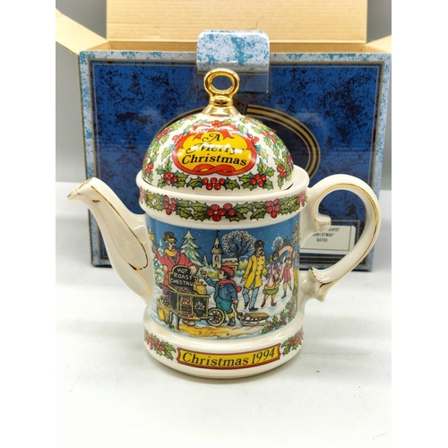 95A - Sadler '1994, A Merry Christmas' Teapot. Boxed. 17cm x 20cm.