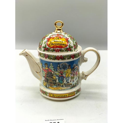 95A - Sadler '1994, A Merry Christmas' Teapot. Boxed. 17cm x 20cm.