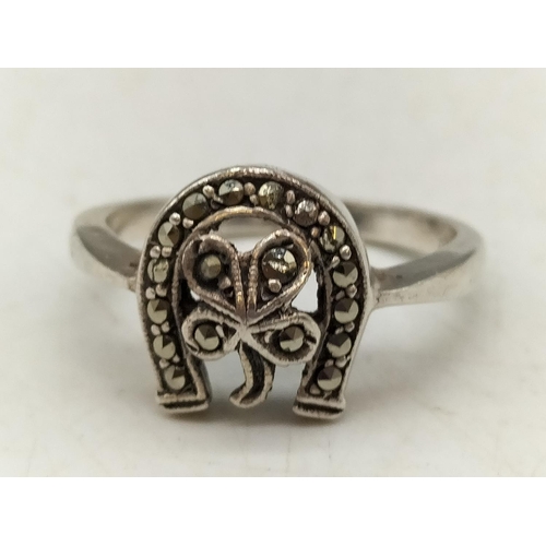 103 - Silver Marcasite Four Leaf Clover and Horseshoe Ring. Size 9.