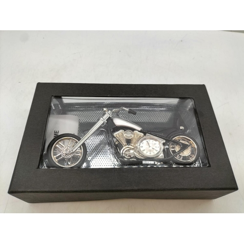 344 - Metalware Motorbike Clock. 7cm x 15cm. Boxed.