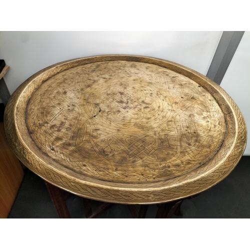 442 - Brass Top Six Leg Table Top. 62cm High, 58cm Diameter. This Lot is Collection Only.