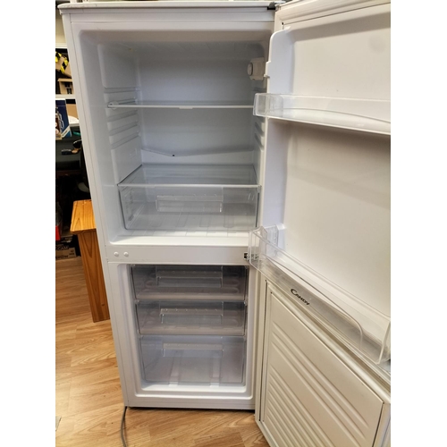 476 - Candy 50/50 Fridge Freezer. 135cm x 55cm x 55cm. This Lot is Collection Only.