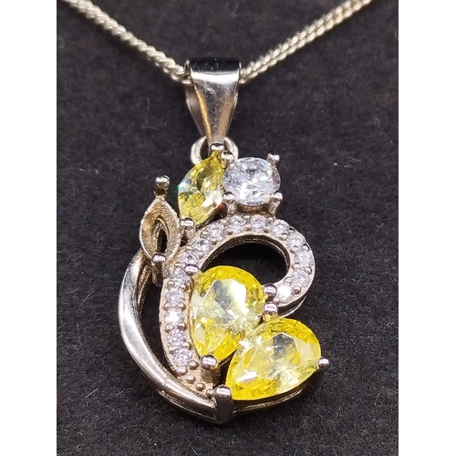 103 - 925 Silver Citrine and Cubic Zirconia Pendant and Earring Set. 1 Stone Missing on Pendant.