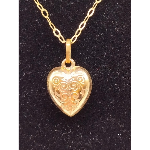 168 - 9ct Gold Heart Pendant and Chain.