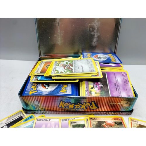 180A - Pokemon Collectors Tins (2) with Cards and Extras.