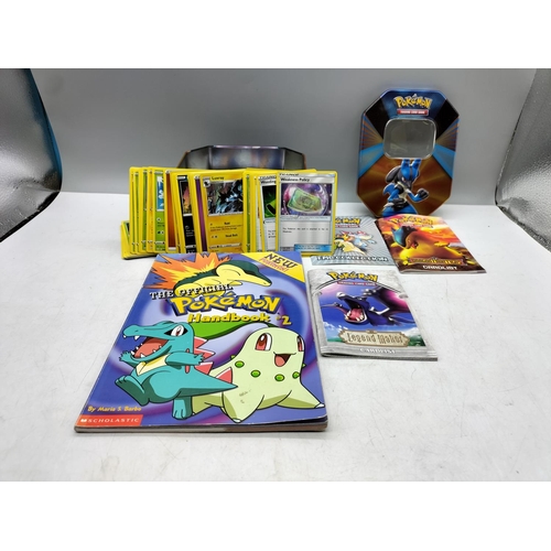 180A - Pokemon Collectors Tins (2) with Cards and Extras.