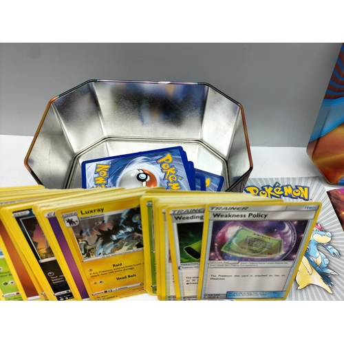 180A - Pokemon Collectors Tins (2) with Cards and Extras.