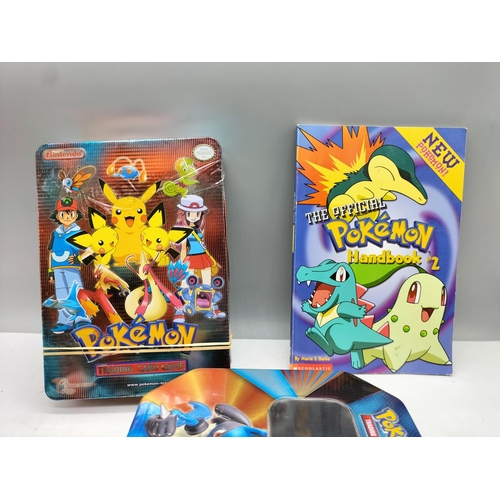 180A - Pokemon Collectors Tins (2) with Cards and Extras.