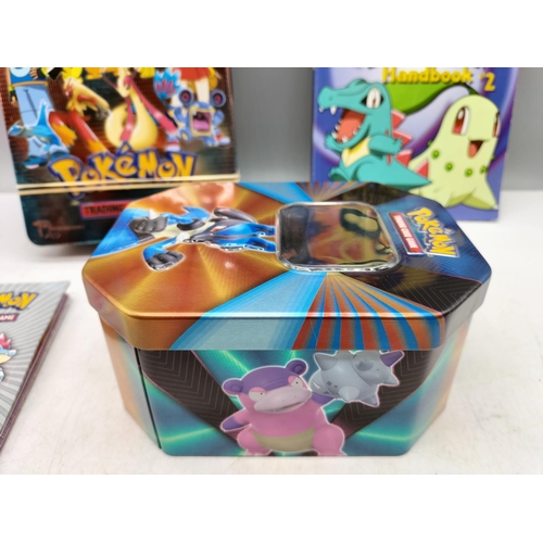 180A - Pokemon Collectors Tins (2) with Cards and Extras.