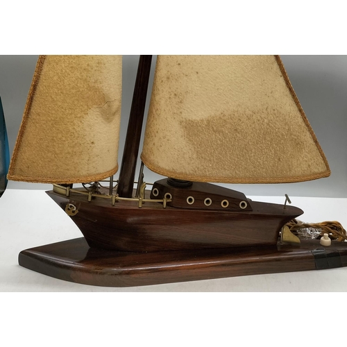 200 - Mahogany Boat Shape Lamp W/O. Damage to Shades. 53cm High, 45cm Long.