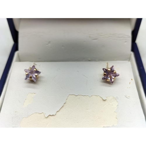 261 - 9ct Gold and Cubic Zirconia Earrings.