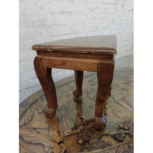 297 - Chinese Carved Design Glass Top Table plus 6 Stools (36cm High). Table measures 125cm x 75cm x 52cm.... 