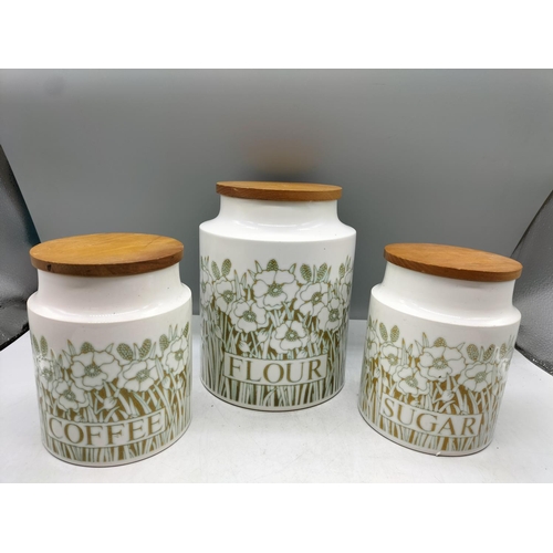 331 - Hornsea Pottery Flour, Sugar and Coffee Canisters in the 'Fleur' Pattern. Tallest being 20cm. A/F - ... 