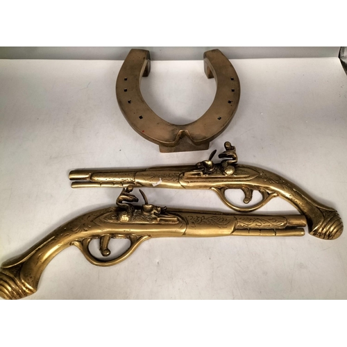 373 - Pair of Brass Wall Hanging Pistols plus Horse Shoe Shaped Trivet.