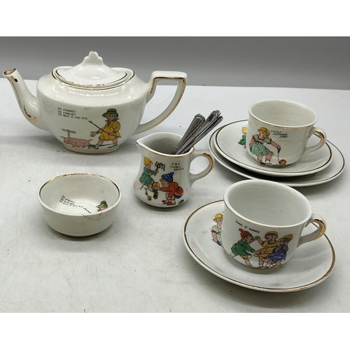 427 - 17 Piece Childs Part Nursery Rhyme Tea Set. Some Age Related Crazing and Some A/F.