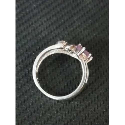 437 - 925 Silver Ring set with 3 Amethysts. Size L