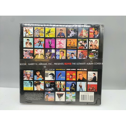 448 - Sealed Elvis Book 'The Ultimate Album Cover'. 27cm x 25cm.