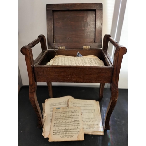 469 - Oak Framed Fabric Seat Piano Stool with Music Sheets. 59cm High, 33cm x 52cm. This Lot is Collection... 