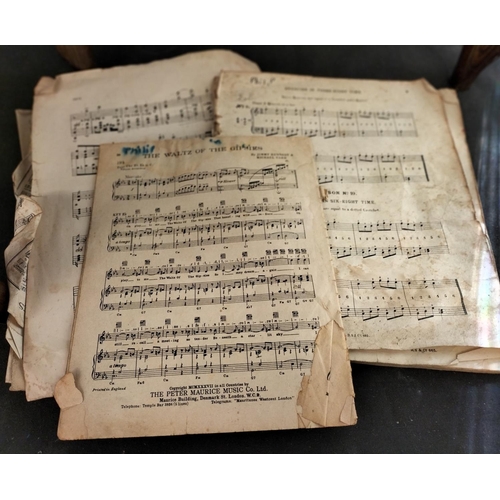 469 - Oak Framed Fabric Seat Piano Stool with Music Sheets. 59cm High, 33cm x 52cm. This Lot is Collection... 