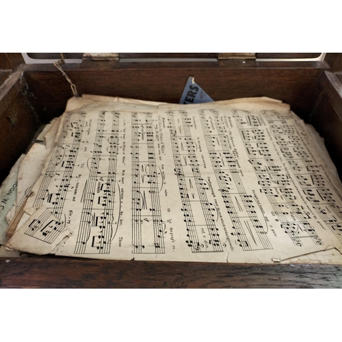 469 - Oak Framed Fabric Seat Piano Stool with Music Sheets. 59cm High, 33cm x 52cm. This Lot is Collection... 