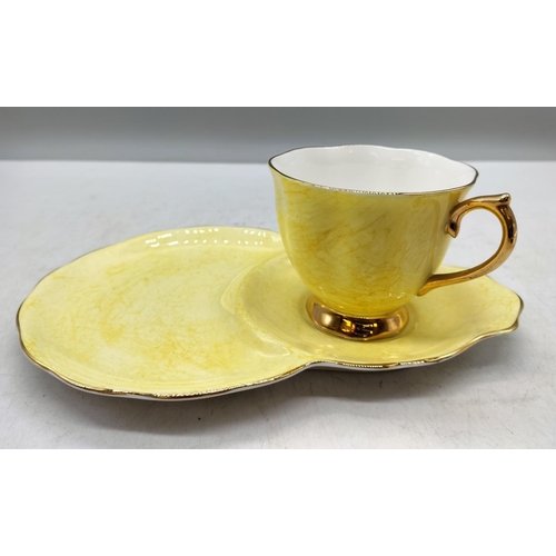 50 - Royal Albert Yellow Tennis Cup and Saucer in the 'Gossamer' Pattern.